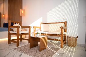Postel nebo postele na pokoji v ubytování Platanos Apartments