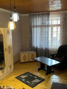 Area soggiorno di Guest House Latali