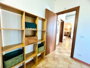 Postel nebo postele na pokoji v ubytování Tri Ri Coppe
