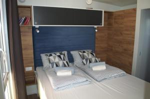 Postel nebo postele na pokoji v ubytování Mobile home - EXCLUSIVE
