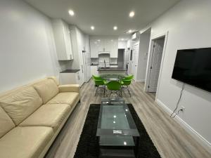 אזור ישיבה ב-Appartement 2 chambres - 202