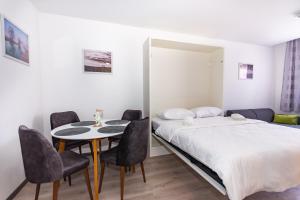 Postel nebo postele na pokoji v ubytování Apartman Krželj B3