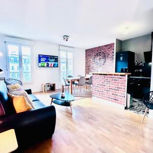 Televisyen dan/atau pusat hiburan di Cosy Apartment Carré Elysée Serris +17 gambar