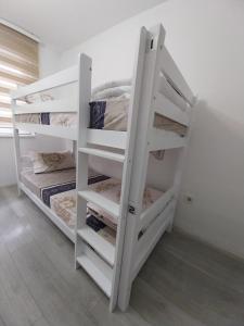 Postel nebo postele na pokoji v ubytování DM Hostel and Apartments