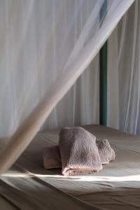 Cama o camas de una habitación en Beachbums CoLiving Midigama