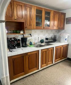 Virtuvė arba virtuvėlė apgyvendinimo įstaigoje Guest House Casa Las Lajas