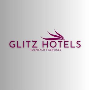 um logótipo para um hotel com as palavras hotéis slipz em New Aksha International By Glitz Hotels em Mumbai