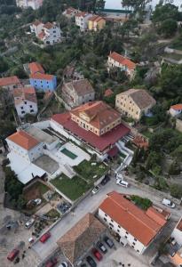 an aerial view of a city with buildings at Hotel Heritage in Veli Lošinj