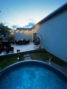 a swimming pool in the yard of a house at AURA Hlinsko in Hlinsko