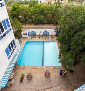 an overhead view of a swimming pool on a building at Luxurious 2-Bedroom Apartment Nyali, Mombasa in Frere Town