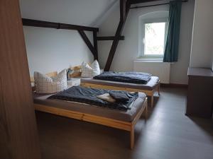 Postel nebo postele na pokoji v ubytování Monteurswohnung und Fewo Dresden