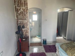 a bathroom with a walk in shower and a walk in shower at Marvel loli camp in Quseir