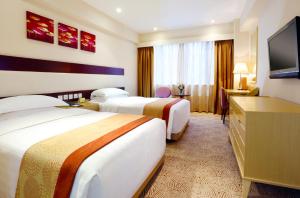 Voodi või voodid majutusasutuse Casa Real Hotel toas