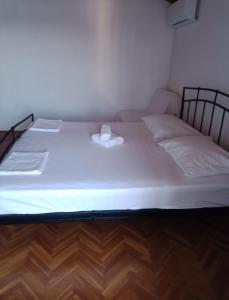 Postel nebo postele na pokoji v ubytování Apartments Lorio