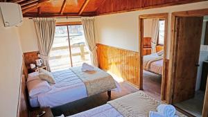 Кровать или кровати в номере Safari Lodge