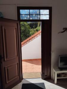 an open door with a view of a balcony at Casa el Hoyo in Hermigua