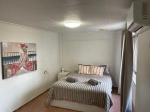 Postel nebo postele na pokoji v ubytování Piso Grande Amplio para grandes grupos 4 Dormitorios 2 baños,Asc 4AC y WIFI