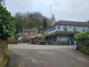 a village with at The Bridge House Restaurant and Hotel in Alton