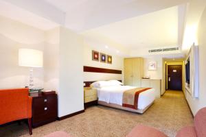 Voodi või voodid majutusasutuse Casa Real Hotel toas