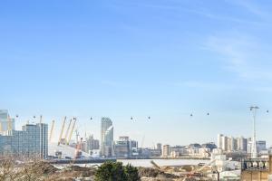 a view of a city skyline with buildings at Khayat Homes - The Lord - One Bed Luxury Apt in London