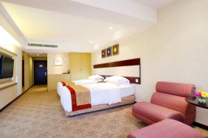 Voodi või voodid majutusasutuse Casa Real Hotel toas