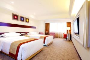 Voodi või voodid majutusasutuse Casa Real Hotel toas