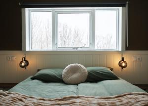 Ein Bett oder Betten in einem Zimmer der Unterkunft Vík Hostel