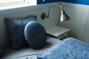 Ein Bett oder Betten in einem Zimmer der Unterkunft Vík Hostel