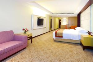 Voodi või voodid majutusasutuse Casa Real Hotel toas