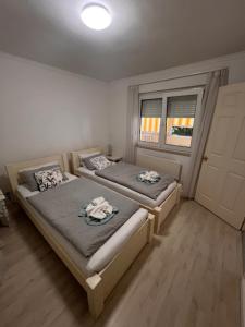 Postel nebo postele na pokoji v ubytování Sofi appartment