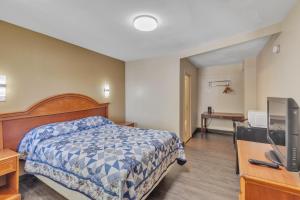 En eller flere senge i et værelse på Viking Motel-Detroit
