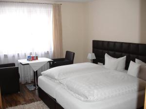 A bed or beds in a room at Haus Zudrell