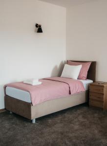 Posteľ alebo postele v izbe v ubytovaní Pansion Mihića dvori