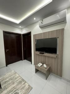 TV a/nebo společenská místnost v ubytování توبال الماسي + 5 fotografií