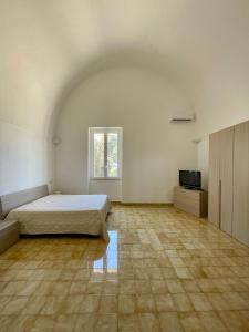 Postel nebo postele na pokoji v ubytování Casa vacanze La colombaia