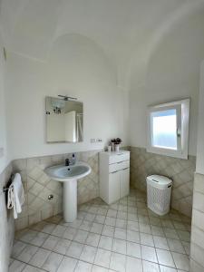 Koupelna v ubytování Casa vacanze La colombaia + 14 fotografií