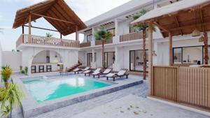 een villa met een zwembad en een huis bij adma hotel in Paje