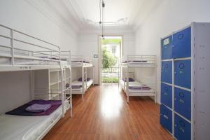 Posteľ alebo postele v izbe v ubytovaní Fabrizzios Terrace Hostel
