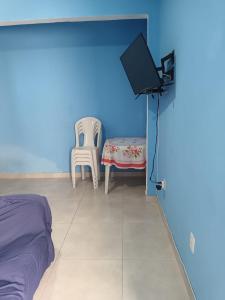 TV a/nebo společenská místnost v ubytování Casa para temporada em Monte Alto - Arraial do Cabo