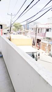 a view of a city from the roof of a building at Rooms Trincomalee Low Price in Trincomalee