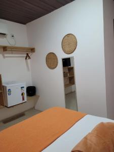 Casa Meu Cantinho客房内的一张或多张床位