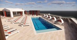 a pool on the deck of a cruise ship at Cozy Unit by Caesars Atlantic City in Atlantic City