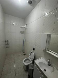 Ett badrum på Casa central com Ar-Condicionado