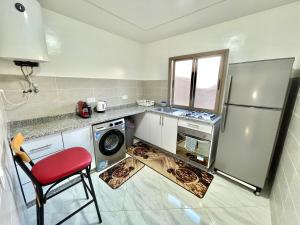 Kuchyň nebo kuchyňský kout v ubytování A3 Luxe and Cosy Apartement 10 min de Hay Riad