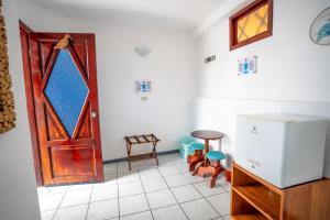 Kuchyň nebo kuchyňský kout v ubytování Maidith Galapagos Inn