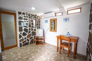 Posezení v ubytování Maidith Galapagos Inn