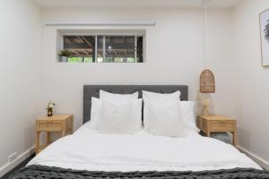 Postel nebo postele na pokoji v ubytování Hills Hideaway