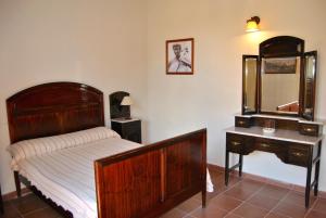 Ένα ή περισσότερα κρεβάτια σε δωμάτιο στο Casa Rural El Granero