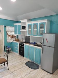 Kuchyň nebo kuchyňský kout v ubytování Argalo Suites 2