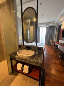 Koupelna v ubytování Grand Miami Hotel
